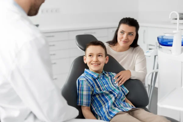 Mother and son visiting the dentist together at a family dental clinic